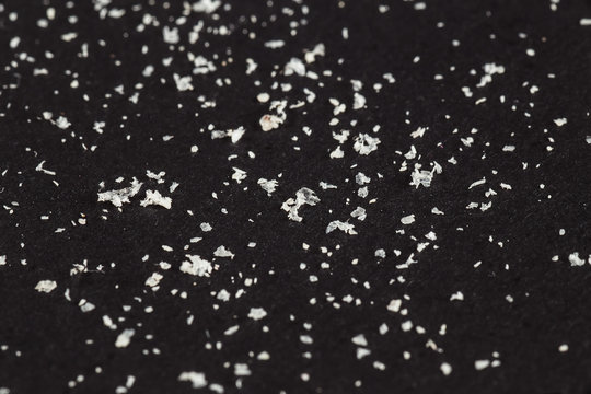 Showered with dandruff on a black background