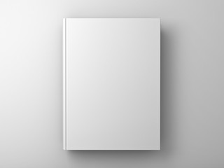 Blank book cover over white wall background with shadow