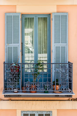 French house with traditional balconies and windows. Nice France