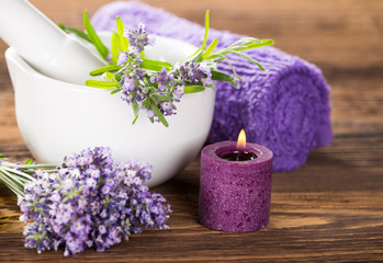 Obraz na płótnie Canvas Wellness treatments with lavender flowers.