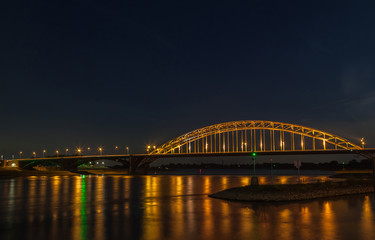Beautiful Waal bridge light up at night
