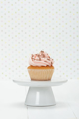 Colorful Homemade Cupcake On White Stand. Copy Space.