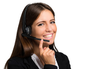     Female customer support operator with headset and smiling