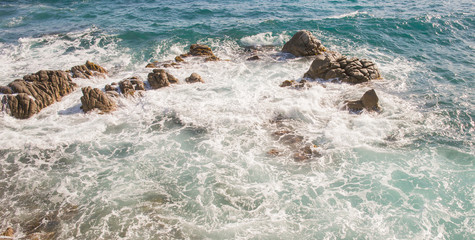 Rocks in the swirling water