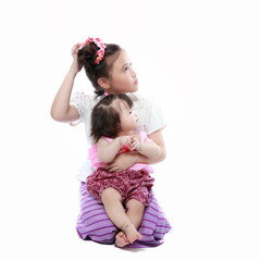 Fototapeta na wymiar baby and littile girl dressing with thai traditional style