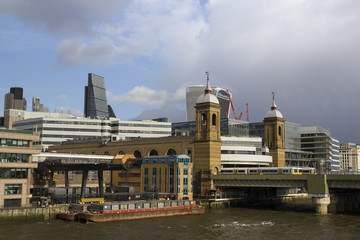 Fototapeta premium London City Skyline with Millennium bridge and construction cranes