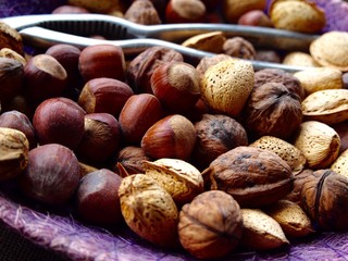 Mix of nuts, almonds and walnuts with nutcracker