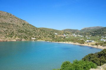 Fototapeta na wymiar Sandy beach in Syros island, Cyclades, Greece. Crystal clear wat
