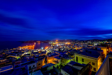 Fototapeta premium Sunset at Syros island. Panoramic view of one of the most beauti