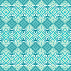 Seamless teal and green abstract geometric vector wallpaper.
