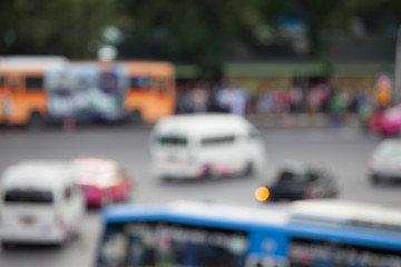 Blurred background of people and traffic jam.