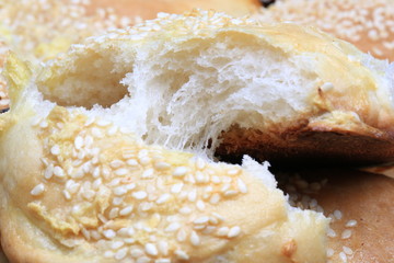 fresh bread buns with sesame garlic home baking rustic style selective focus