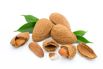 Almonds with leaves isolated on white background
