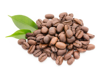 Coffee grains and leaves isolated on the white backgrounds.