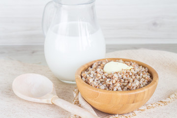 Buckwheat porridge in a wooden bowl