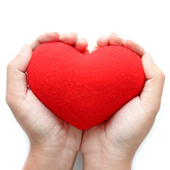 Fototapeta premium Red heart symbol on hands