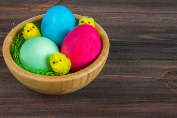 Colored eggs in the basket