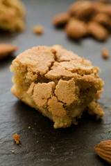 White chocolate and almond brownie on dark