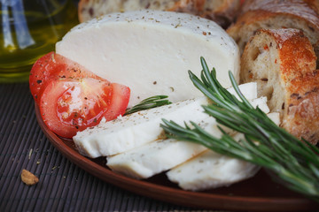 Fresh vegetable salad with tomatoes, cucumbers and onions. Serve
