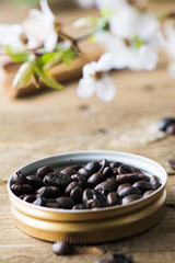Coffee beans on wooden table