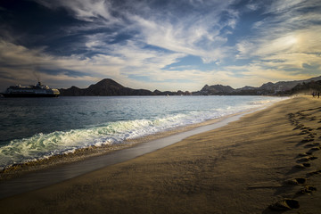 Fototapeta na wymiar Sandy Beach View of Waves at Beach in Mexico, Cabo San Lucas
