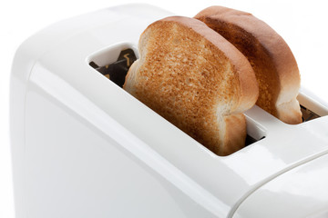 bread toast in a toaster.