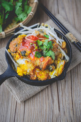 fried mussel pancake with old wooden background