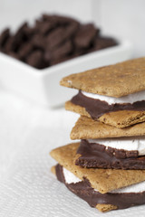 cropped image of smores sandwich.