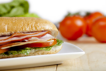 close up image of ham sandwich
