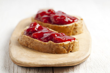 whole wheat bread with strawberry jam