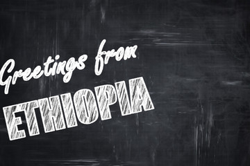 Chalkboard background with chalk letters: Greetings from ehtopia