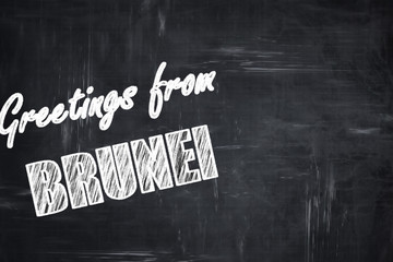Chalkboard background with chalk letters: Greetings from brunei