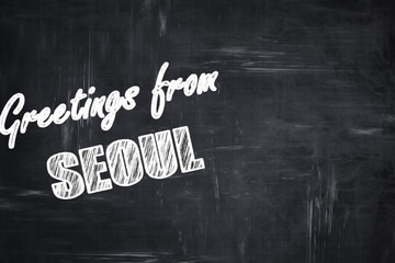 Chalkboard background with chalk letters: Greetings from seoul