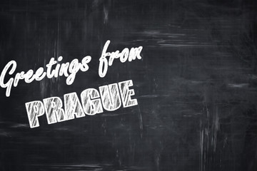 Chalkboard background with chalk letters: Greetings from prague