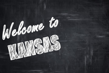 Chalkboard background with chalk letters: Welcome to kansas