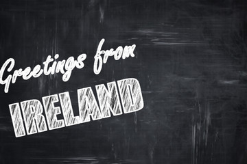 Chalkboard background with chalk letters: Greetings from ireland
