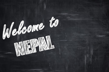 Chalkboard background with chalk letters: Welcome to nepal