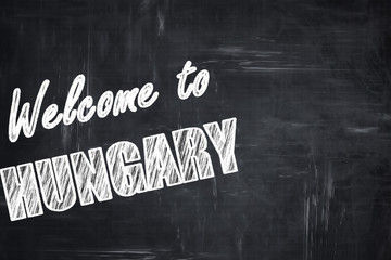Chalkboard background with chalk letters: Welcome to hungary