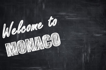 Chalkboard background with chalk letters: Welcome to monaco