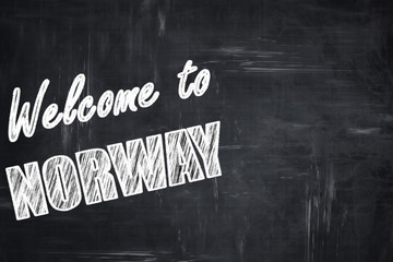 Chalkboard background with chalk letters: Welcome to norway