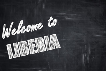 Chalkboard background with chalk letters: Welcome to liberia