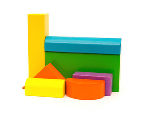 different color and shape wooden toy blocks on white background