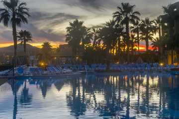 Fototapeta na wymiar Poolside View at a Luxury Beach Resort in Mexico