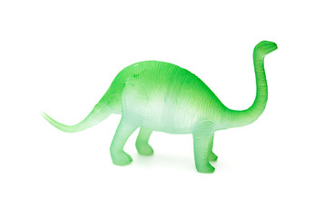 side view green plastic brachiosaurus toy on a white background