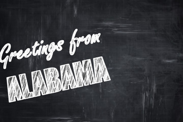 Chalkboard background with chalk letters: Greetings from alabama