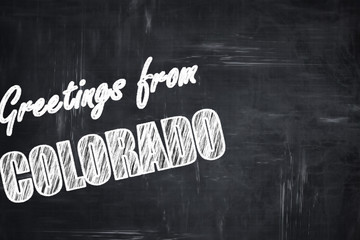 Chalkboard background with chalk letters: Greetings from colarod