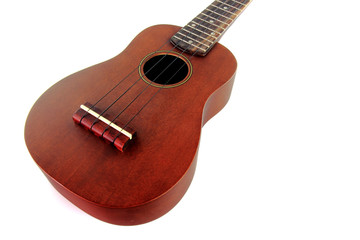 Fototapeta premium Vintage closeup ukulele on white isolated.