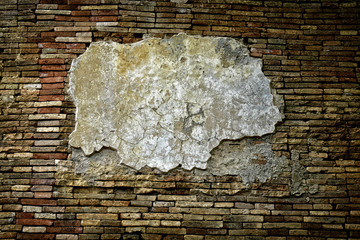 Old grunge brick wall with frame for text or picture.