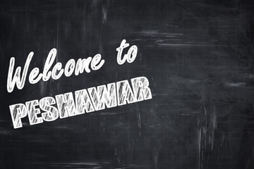 Chalkboard background with chalk letters: Welcome to peshawar
