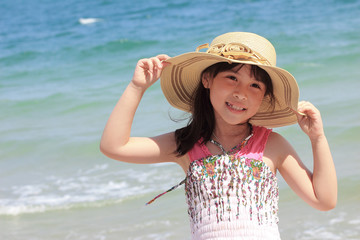 Asian young girl on the beach